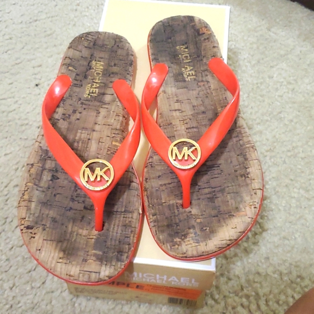 MK thong flip flops